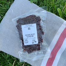Load image into Gallery viewer, Where Huron county and Middlesex County meet, Wholesome Pastures offers a variety of beef cuts such as their delicious beef jerky, pictured here. They sell grass fed and grass finished and pastured meat. 
